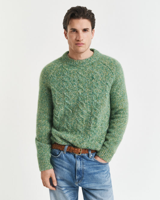 Pull ras du cou en maille torsadée