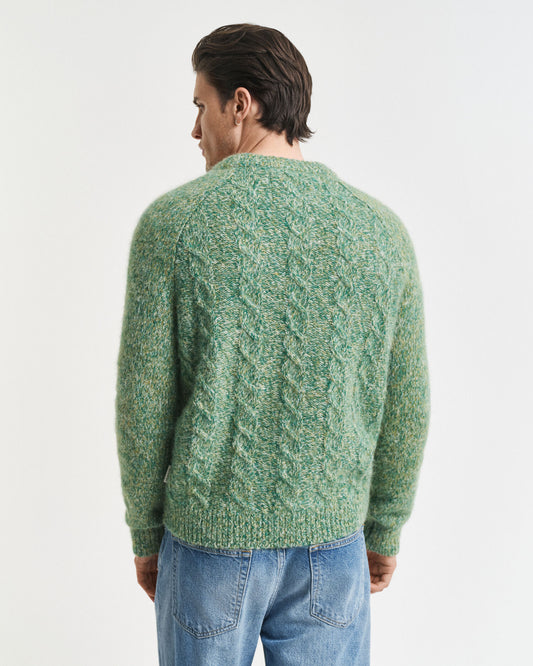 Pull ras du cou en maille torsadée