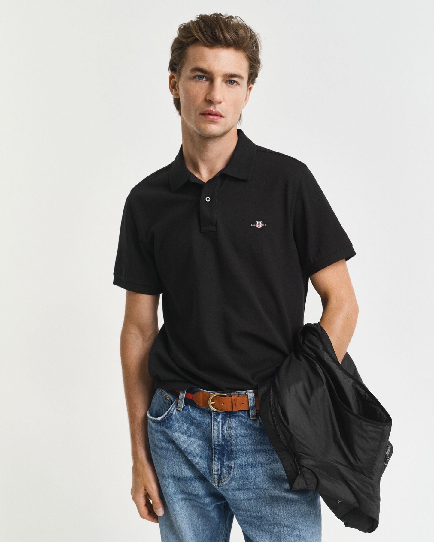 Polo piqué à écusson coupe droite